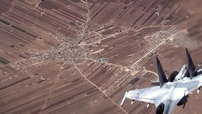 A Russian fighter jet flew very close to a manned US surveillance aircraft over Syria. Photo / AP