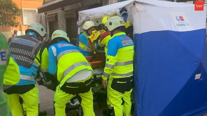 This screen grab of a handout video posted on the X (formerly Twitter) account of Madrid emergency services shows emergency services members working after an explosion in a bar in Madrid's Vallecas neighbourhood injured 21 people, three of them seriously, Spanish emergency services said. Photo / AFP