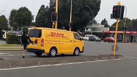 Watch: Teen scooter rider seen kicking courier van in road rage outburst