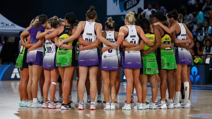The Pulse and the Stars huddle during an ANZ Premiership game last season. Photo / Photosport
