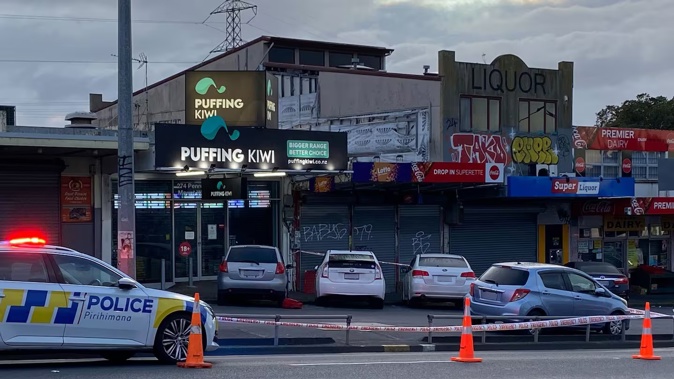 A homicide investigation is under way after a man was found dead in a car outside shops on Penrose Rd in Mt Wellington. Photo / Isaac Davison