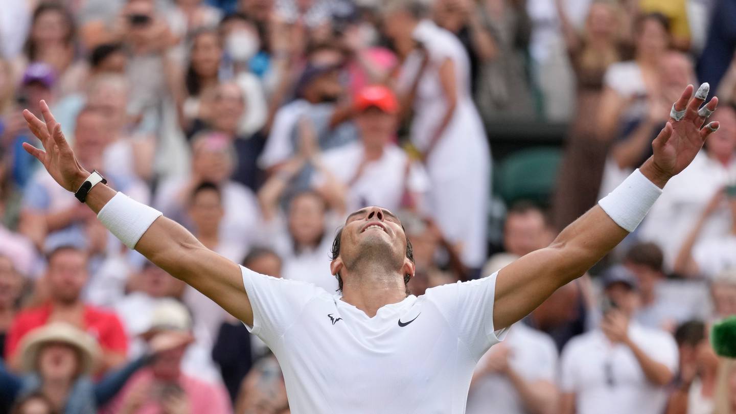 Spain's Rafael Nadal celebrates after beating Taylor Fritz of the US in a men's singles quarterfinal at Wimbledon. Photo / AP