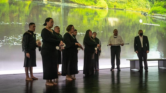Whanganui River iwi members perform the tāngaengae ritual at dawn in the New Zealand Pavilion in Dubai. (Photo / NZ Herald)