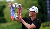 Daniel Hillier of New Zealand poses with the British Masters trophy. Photo / AP