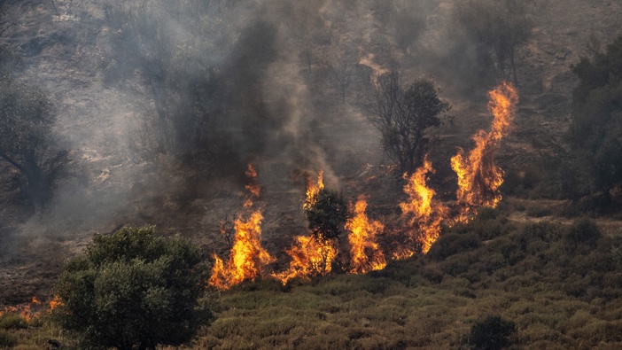 Smoke and flame rise after Hezbollah carried out one of the largest missile attacks on Safed city, northern Israel on June 12, 2024. Photo / Getty