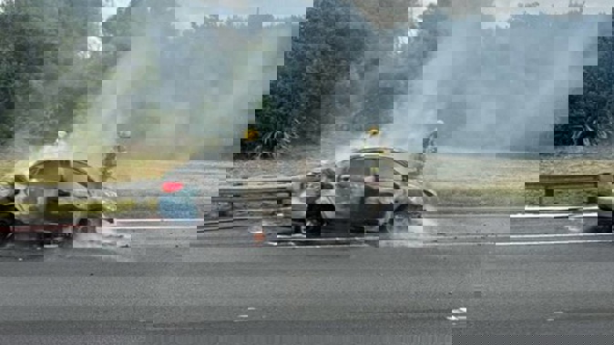 A fire has left the charred remains of a car on Auckland's Southern Motorway, creating major northbound traffic backlogs ahead of rush hour on Wednesday.