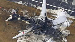 JAL 516 and a Japanese coast guard aircraft collided on the runway at Tokyo's Haneda Airport on Tuesday and burst into flames, killing several people aboard the coast guard plane, officials said. Photo / Kyodo News via AP