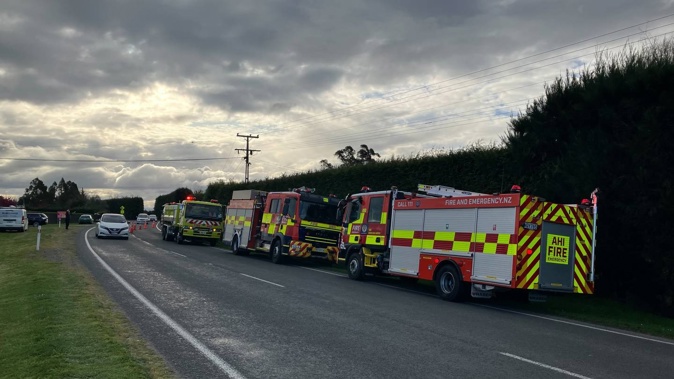 The Fire Emergency NZ crews in Te Aute Rd, south of Hastings, during a Monday afternoon house fire. Photo / Chris Hyde