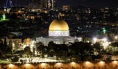The lit-up Dome of the Rock Shrine in the Aqsa Mosque compound in the old city of Jerusalem is pictured at night. Australia has 115,000 nationals stuck in the Middle East, including in Israel. Photo / Hazem Bader, AFP