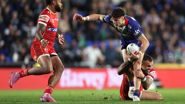 Sam Healey of the Warriors is tackled during the round 22 NRL match between Warriors and the Dolphins at Go Media Stadium, on August 01, 2025, in Auckland, New Zealand. (Photo by Phil Walter/Getty Images)