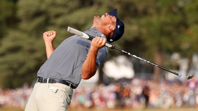Bryson DeChambeau celebrates putting on the 18th green to win during the final round of the 124th U.S. Open. Photo / Getty Images