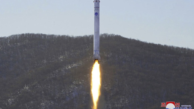 A photo provided by the North Korean government shows what it says is a test of a rocket with the test satellite at the Sohae Satellite Launching Ground in North Korea. Photo / AP