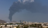 Smoke rises after an explosion in the industrial zone, caused by debris after interception of a drone by air defence, according to the Fujairah media office on March 05, 2026, in Fujairah, United Arab Emirates. (Photo by Christopher Pike/Getty Images)