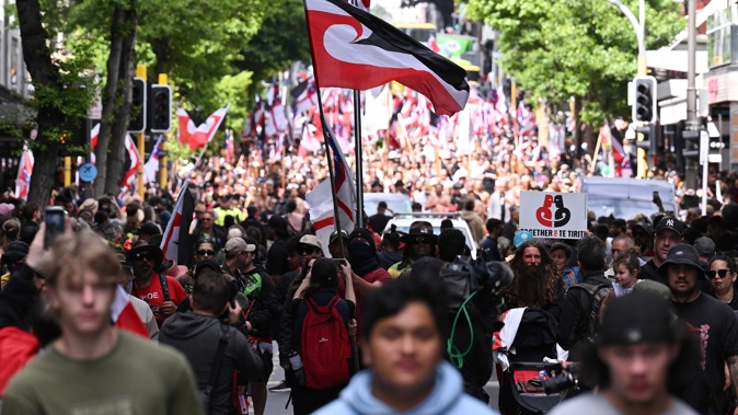 Hīkoi members leave Waitangi Park and walk along the streets heading towards Parliament in Wellington. Photo / Getty Images