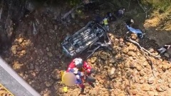 A car ended up on it's roof at Colville, Coromandel after it left the road at the weekend. Photo / Auckland Rescue Helicopter Trust