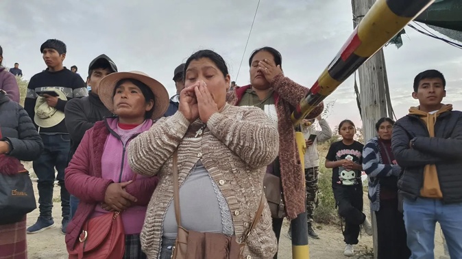 Relatives of the victims were brought by buses to the mine. Photo / AP