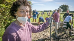 Taradale High School teacher Michelle Manning and colleagues undertook a working bee at her Links Rd property during national strike action on Thursday. Photo / Warren Buckland