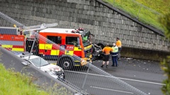 The scene of a fatal crash on Auckland's Upper Harbour Highway where a car drove into a stationary speed camera van.