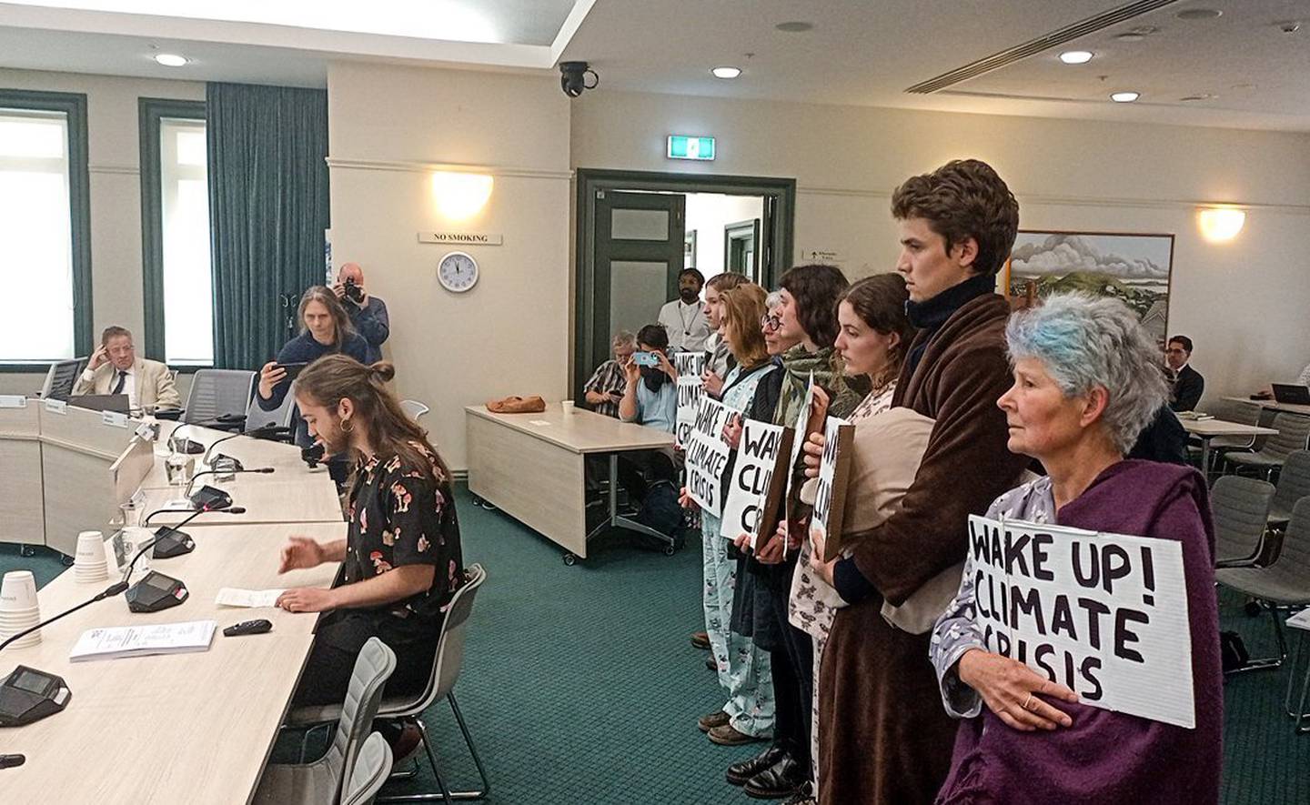 Restore Passenger Rail spokesman Jonty Coulson addresses the council with the group's concerns. Photo / supplied.