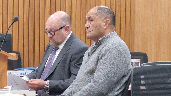 Vaughan Tairoa (right) with defence lawyer Michael Bott in the Hutt Valley District Court.