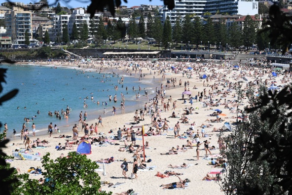 Sunbathers gather on Coogee Beach, September 12, 2021 in Sydney, Australia. (Photo / Getty)