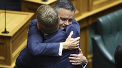 Green Party co-leader James Shaw and Labour leader Chris Hipkins console each other during to a tribute to Efeso Collins at Parliament in Wellington on Wednesday 21 Feb 2024. Green MP Efeso Collins collapsed and died while taking part in the ChildFund Water Run in Auckland. Credit: Hagen Hopkins.