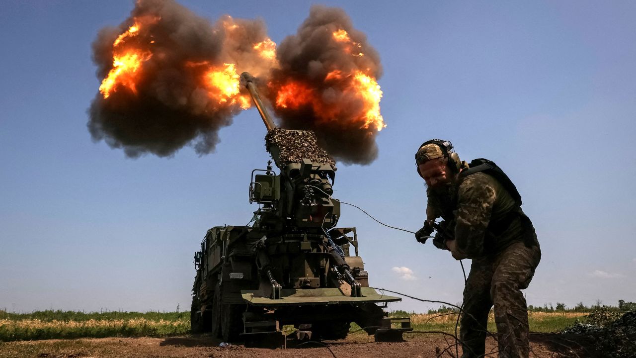 A Ukrainian serviceman fires toward Russian troops at a position near the city of Bakhmut in the Donetsk region of Ukraine on July 5. Sofiia Gatilova/Reuters