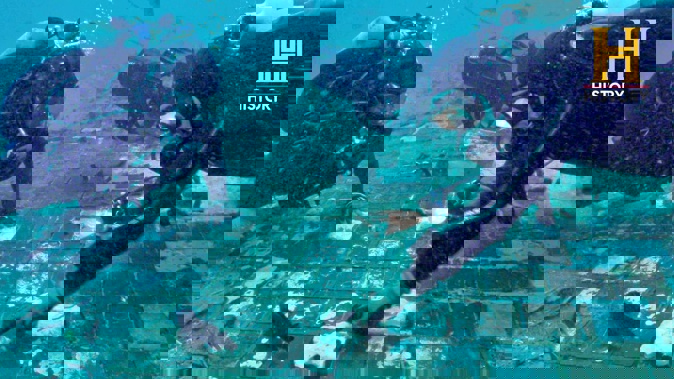 Underwater explorer and marine biologist Mike Barnette and wreck diver Jimmy Gadomski explore a 6m segment of the 1986 space shuttle Challenger discovered in the waters off the coast of Florida. Photo / AP