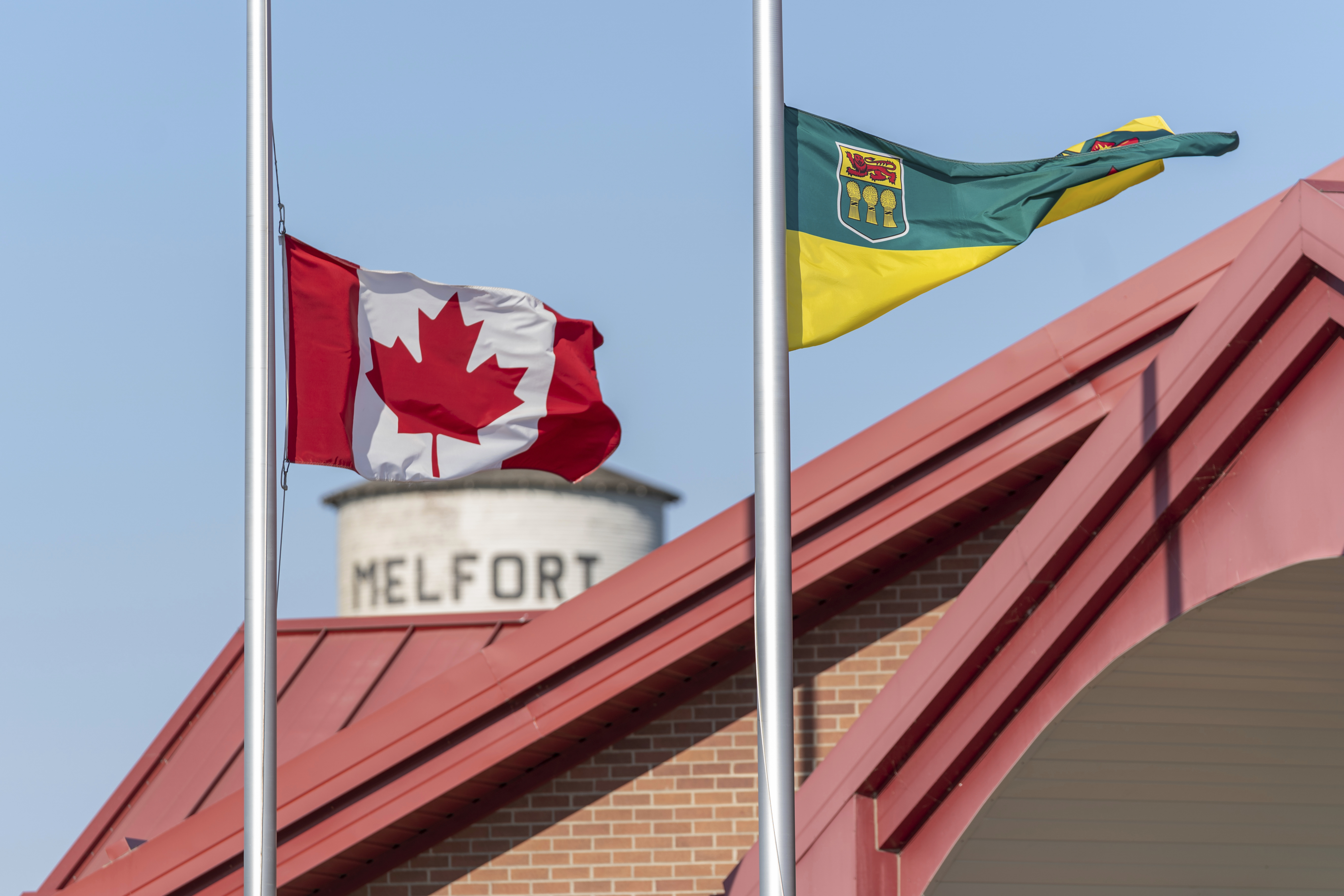 The flag of Canada and the flag of Saskatchewan are at half-mast to show respect to the victims of the stabbing rampage that happened at James Smith Cree Nation and Welton at the City Hall of Melfort, in Saskatchewan. Photo / AP
