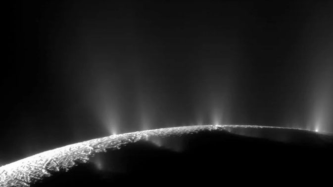 Plumes can be seen releasing water vapor and organic compounds into space at the south pole of Saturn's moon Enceladus.