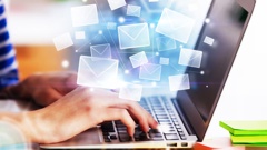 Hands using laptop with abstract email interface. E-mail networking concept. 3D Rendering