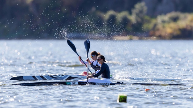 Aimee Fisher and Lisa Carrington at the finish line during Women's K1 500m Canoe World Championship Qualification Race 3 at Lake Karapiro. (Photo / Photosport)