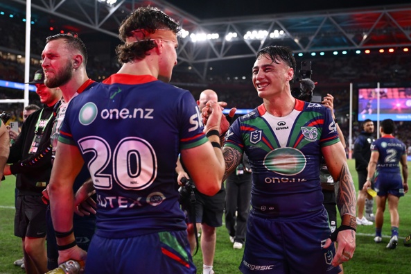 Charnze Nicoll-Klokstad and Sam Healey of the Warriors celebrate after winning the round nine NRL match between the New Zealand Warriors and North Queensland Cowboys at Suncorp Stadium on May 03, 2025, in Brisbane, Australia. (Photo by Hannah Peters/Getty Images)