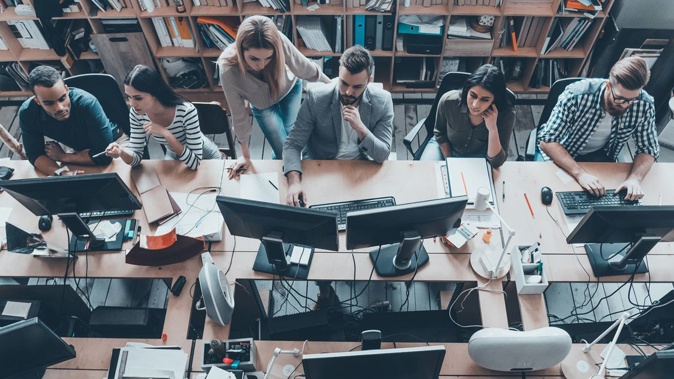 There's a growing movement around the world to reduce the time spent at work. Photo / 123rf