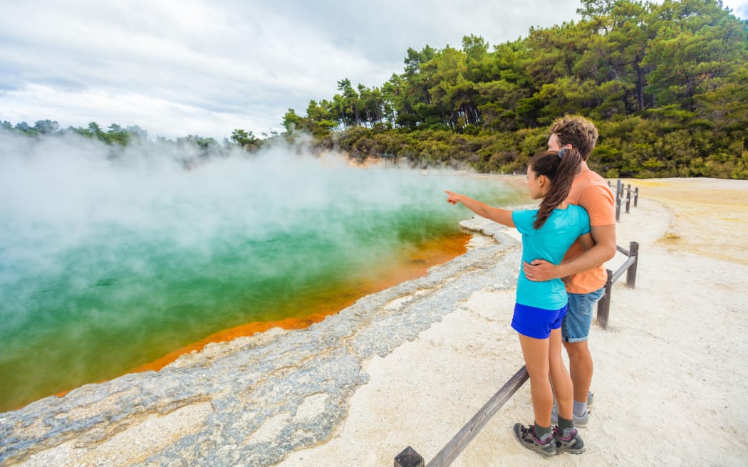 Tourists visiting Champagne Pool at Wai-O-Tapu thermal park in Rotorua Photo: 123RF
