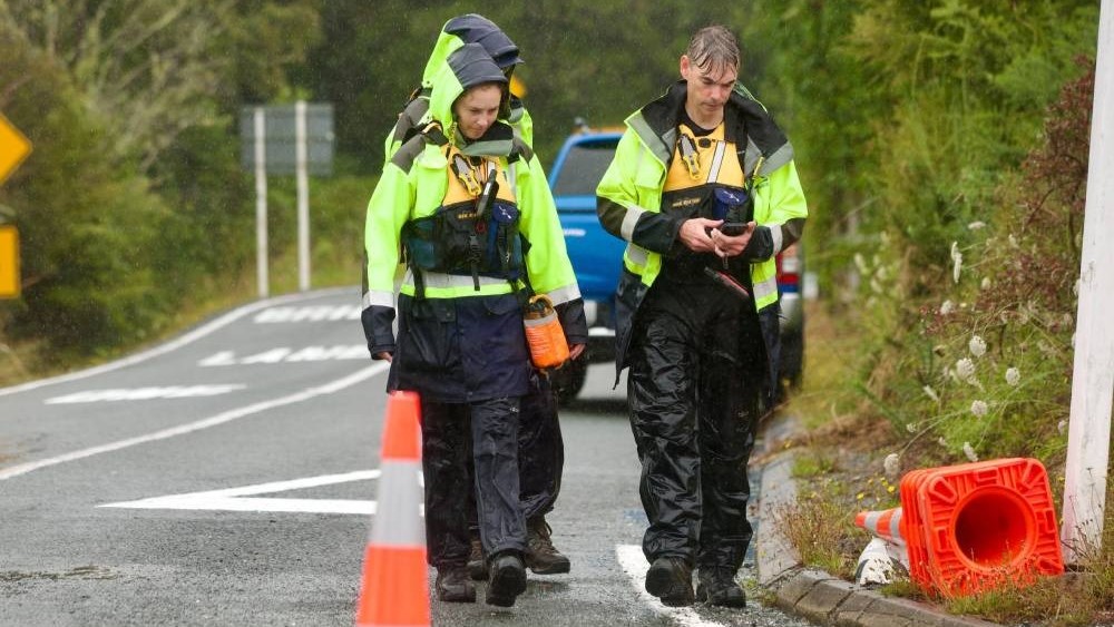 Family's desperate wait as police search for man missing in raging floods