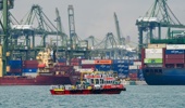 Vessels with shipping containers are seen at Pasir Panjang port terminal in Singapore on October 17, 2025. Photo / Roslan Rahman, AFP