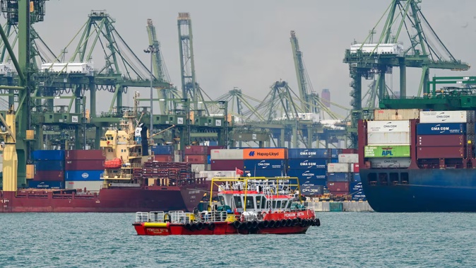 Vessels with shipping containers are seen at Pasir Panjang port terminal in Singapore on October 17, 2025. Photo / Roslan Rahman, AFP