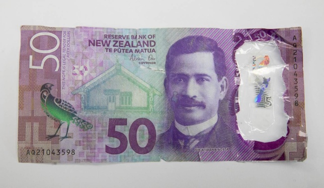 A counterfeit $50 note handed over at Sunset Rd Bottle-O. Photo / Andrew Warner