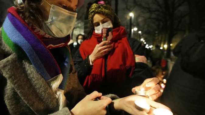 A group of women's rights activists protest against Poland's strict anti-abortion law. Photo / AP