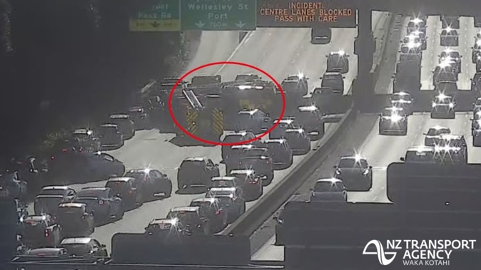 Emergency services are responding to a crash involving a motorbike and car on Auckland's Southern Motorway.