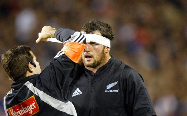 Carl Hayman's head is taped during the All Blacks Test match against England at Eden Park in 2004. (Photo / Photosport)