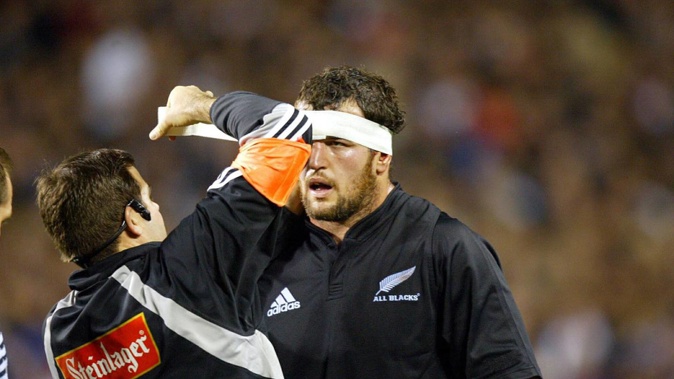 Carl Hayman's head is taped during the All Blacks Test match against England at Eden Park in 2004. (Photo / Photosport)