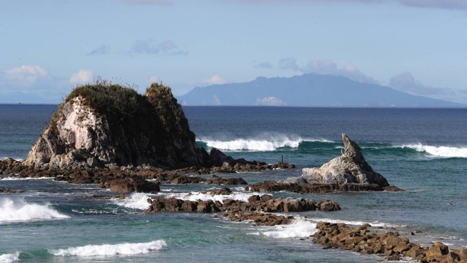 The bar break at Mangawhai Heads (right) has powerful waves breaking on a shallow sand bottom, with rips created by the estuary. Photo / John Stone
