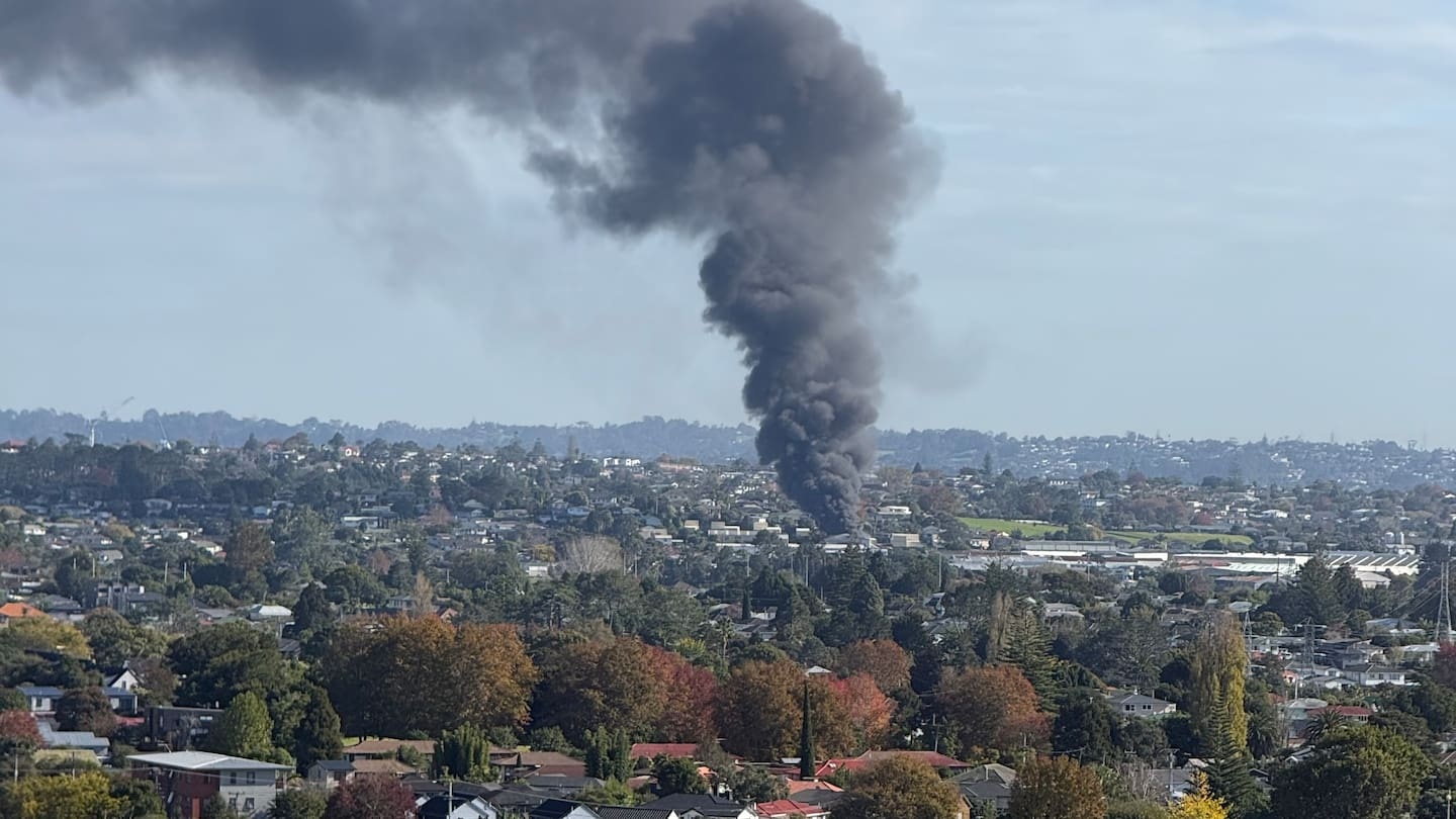 Black smoke billows over Auckland as crews race to large factory fire