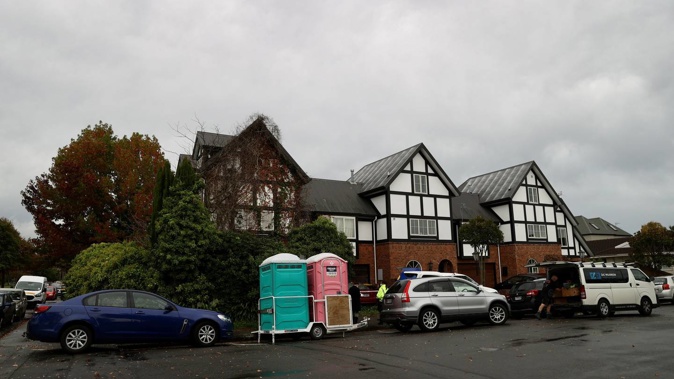 Commerical cleaners have moved into work at a Christchurch house where a woman and her son were found dead. Photo / George Heard