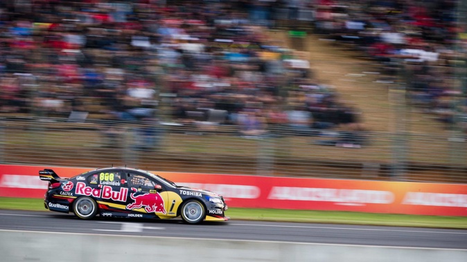 Craig Lowndes races along the main straight during the Supercars race at Pukekohe Park in 2014.