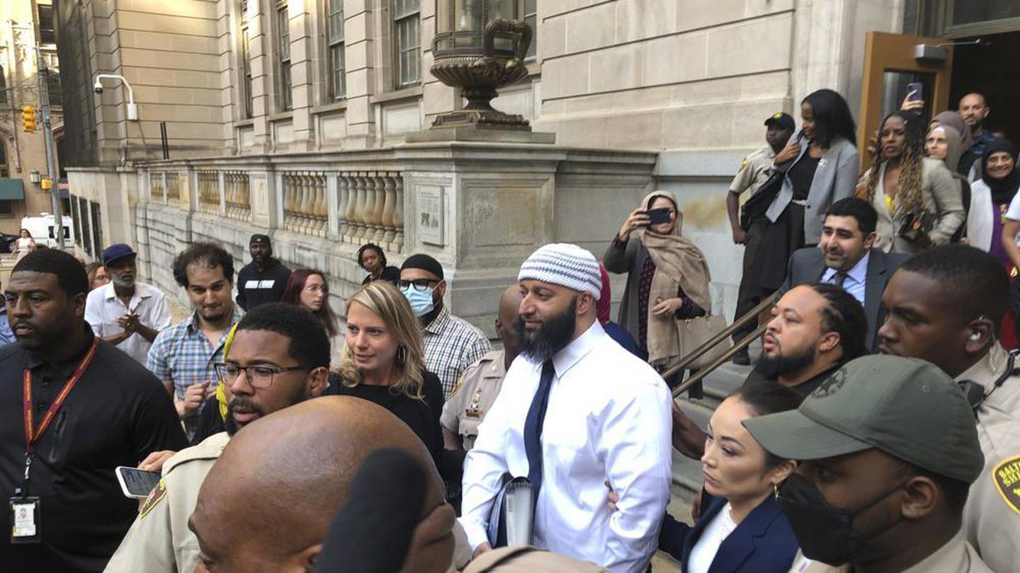 Adnan Syed, center, leaves the Elijah E. Cummings Courthouse on September 19 in Baltimore. Photo / AP
