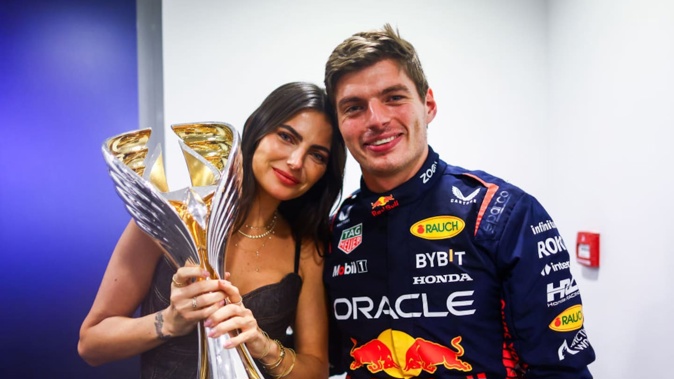 Max Verstappen with partner Kelly Piquet after he won the F1 Grand Prix of Abu Dhabi last year. Photo /Getty Images