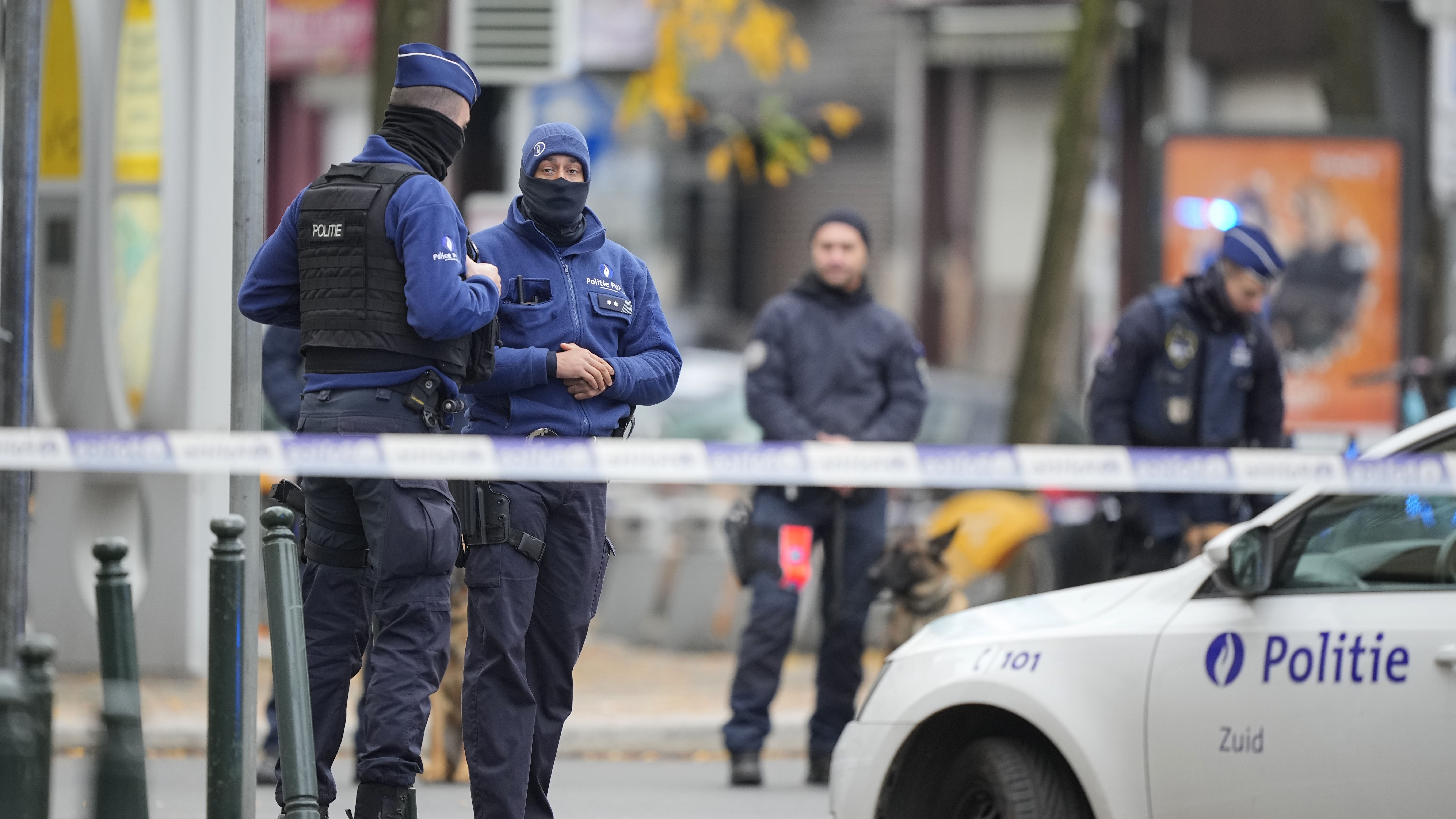 Belgian Police stand behind a cordoned off area close to where a suspected Tunisian extremist has been shot dead hours after manhunt looking for him Tuesday, Oct. 17, 2023. Photo / AP